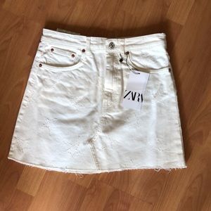 Star white denim mini skirt